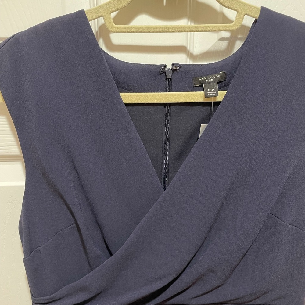 Never worn Ann Taylor Dress Navy Blue tags on it! Perfect sheath dress!